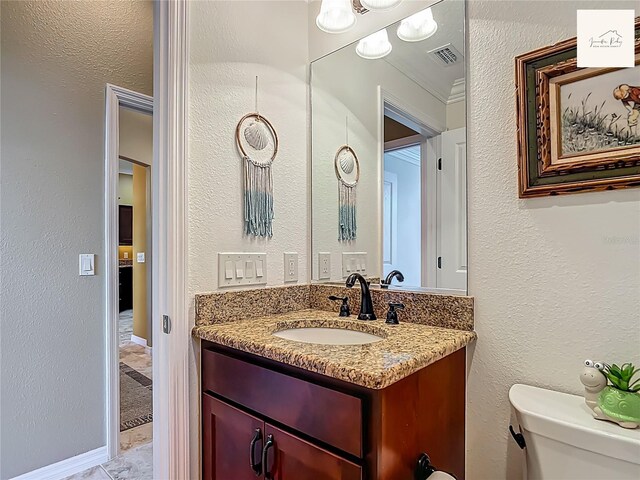 2994 Adrienne Way, The Villages, FL 32163 - bathroom with toilet and vanity