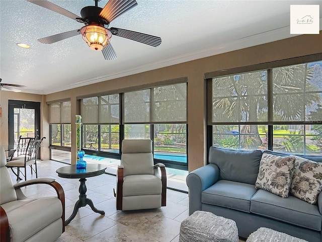 2994 Adrienne Way, The Villages, FL 32163 - sunroom / solarium with a textured ceiling, tile patterned floors, and ornamental molding