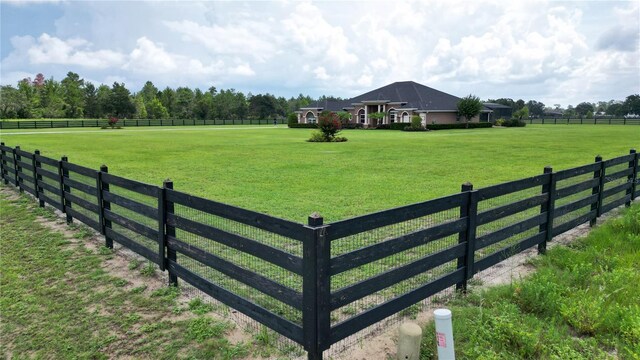 29222 Can Do Ln, Tavares, FL 32778 - gate featuring a rural view
