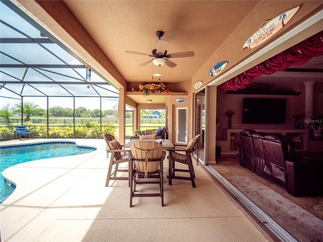 29222 Can Do Ln, Tavares, FL 32778 - view of patio / terrace with ceiling fan, a lanai, and an outdoor pool