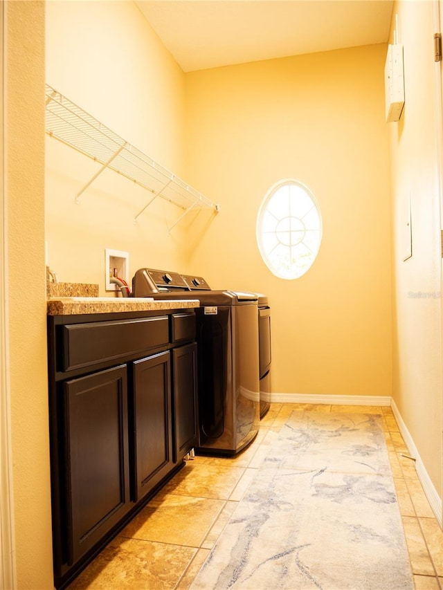 29222 Can Do Ln, Tavares, FL 32778 - washroom with cabinet space and separate washer and dryer
