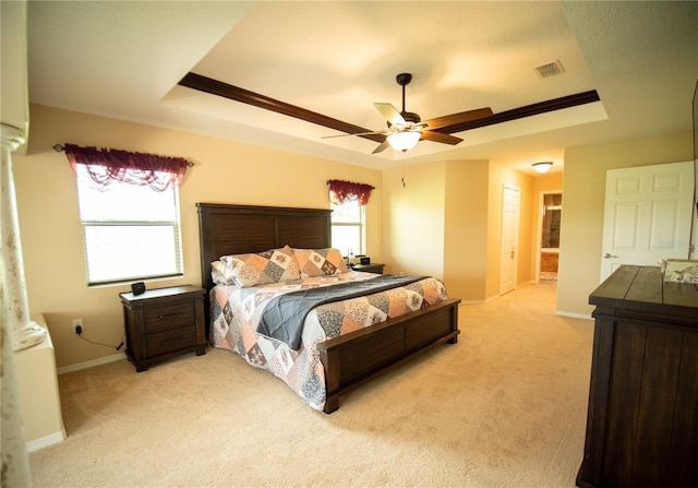 29222 Can Do Ln, Tavares, FL 32778 - bedroom featuring a raised ceiling, light carpet, crown molding, and a ceiling fan