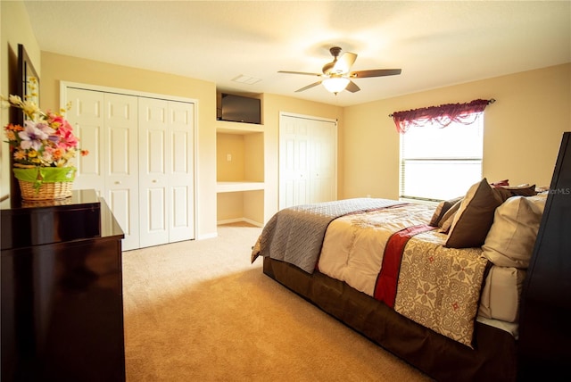 29222 Can Do Ln, Tavares, FL 32778 - bedroom with two closets, carpet flooring, and ceiling fan
