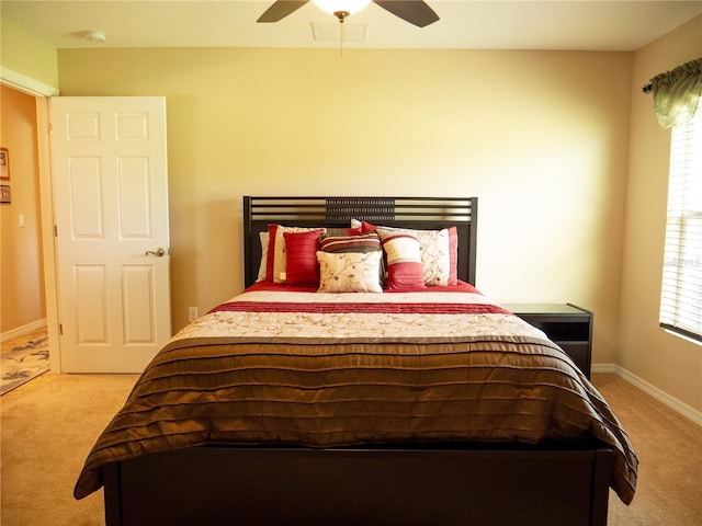 29222 Can Do Ln, Tavares, FL 32778 - bedroom with light carpet and ceiling fan