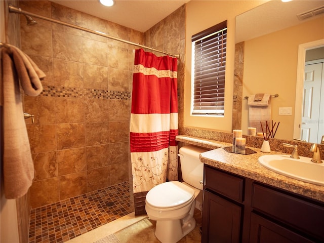 29222 Can Do Ln, Tavares, FL 32778 - full bathroom featuring a tile shower, vanity, and tile patterned floors