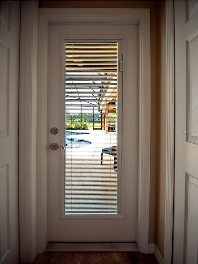 29222 Can Do Ln, Tavares, FL 32778 - doorway featuring baseboards