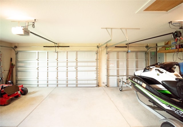 29222 Can Do Ln, Tavares, FL 32778 - garage featuring a garage door opener and electric panel