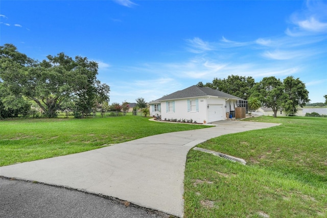 15629 Catherine Cir, Groveland, FL 34736 - view of property exterior featuring an attached garage and concrete driveway