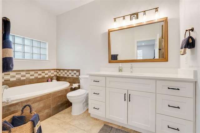 15629 Catherine Cir, Groveland, FL 34736 - full bathroom featuring a garden tub, tile patterned flooring, and vanity