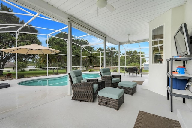 15629 Catherine Cir, Groveland, FL 34736 - view of patio / terrace featuring ceiling fan, an outdoor pool, a lanai, and outdoor dining area