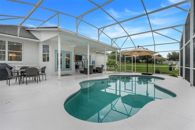 15629 Catherine Cir, Groveland, FL 34736 - outdoor pool with french doors, a patio area, ceiling fan, and a lanai