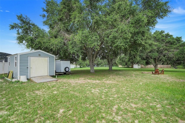 15629 Catherine Cir, Groveland, FL 34736 - view of grassy yard with a storage shed