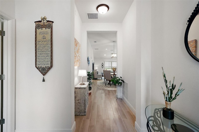 10363 Addison Shore Way, Oxford, FL 34484 - corridor with wood finished floors and recessed lighting