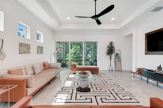 1990 Wallingford Loop, Mount Dora, FL 32757 - living room featuring ceiling fan, a tray ceiling, healthy amount of natural light, and recessed lighting