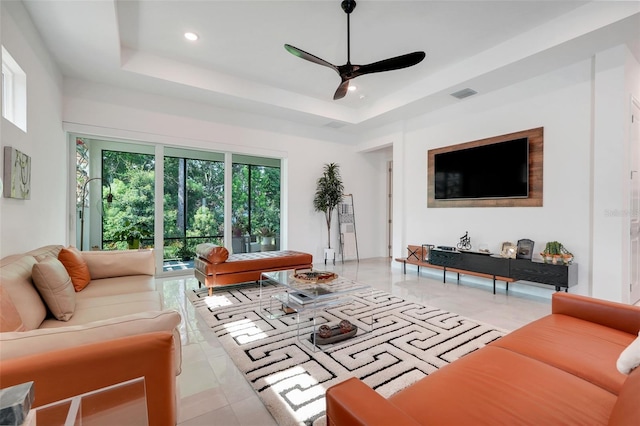 1990 Wallingford Loop, Mount Dora, FL 32757 - living area featuring ceiling fan, a tray ceiling, and recessed lighting