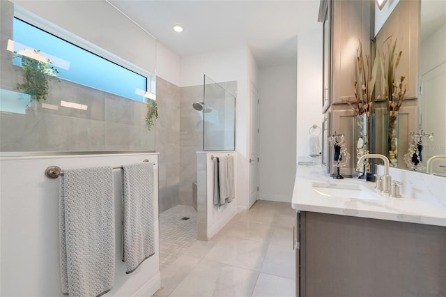 1990 Wallingford Loop, Mount Dora, FL 32757 - bathroom featuring double vanity, walk in shower, recessed lighting, and tile patterned floors