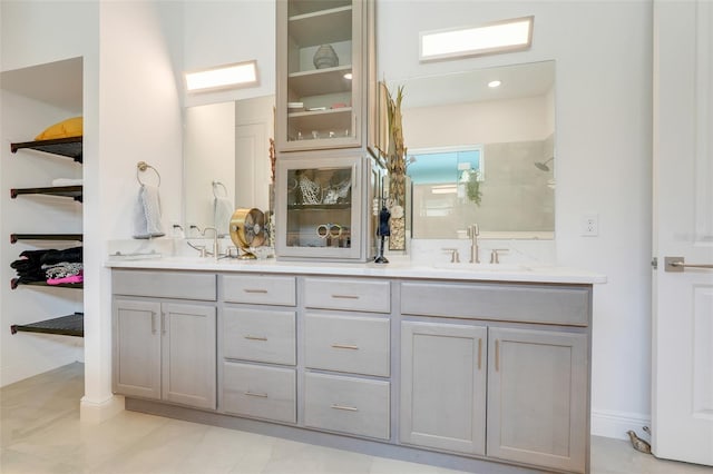 1990 Wallingford Loop, Mount Dora, FL 32757 - bathroom featuring double vanity and a shower
