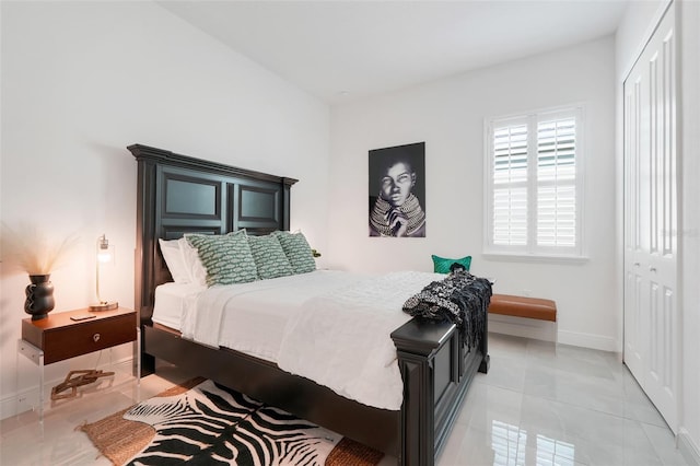 1990 Wallingford Loop, Mount Dora, FL 32757 - bedroom with a closet and light tile patterned floors