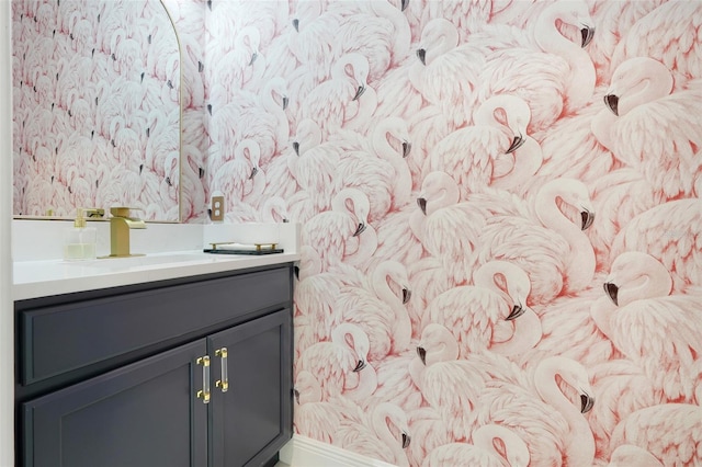 1990 Wallingford Loop, Mount Dora, FL 32757 - bathroom featuring vanity and wallpapered walls