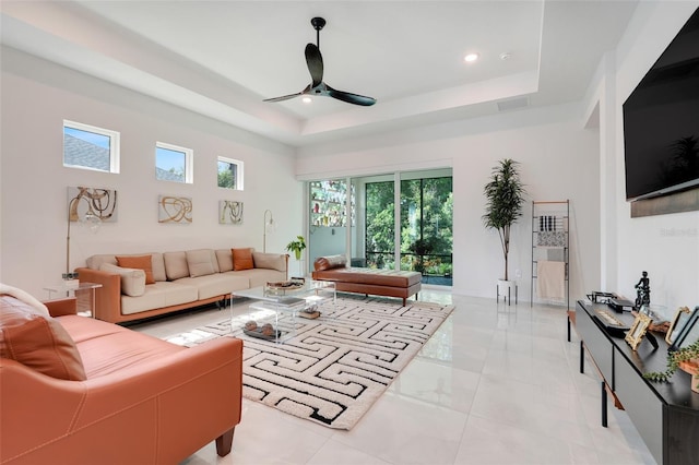 1990 Wallingford Loop, Mount Dora, FL 32757 - living room featuring a ceiling fan, a raised ceiling, and recessed lighting