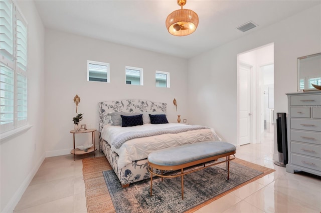 1990 Wallingford Loop, Mount Dora, FL 32757 - bedroom with multiple windows and light tile patterned flooring