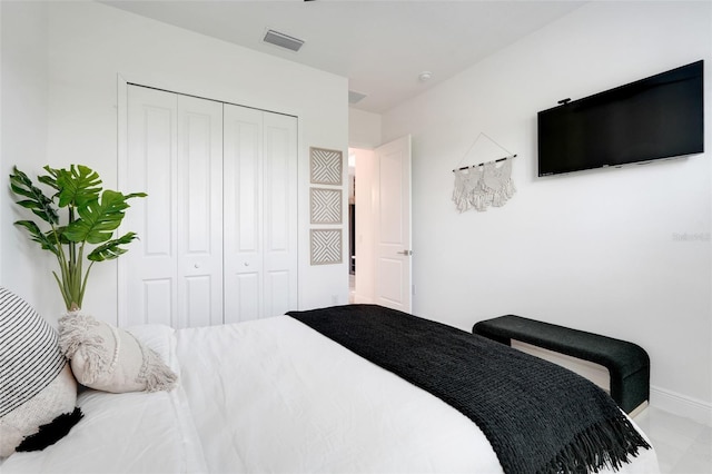 1990 Wallingford Loop, Mount Dora, FL 32757 - bedroom with a closet and baseboards