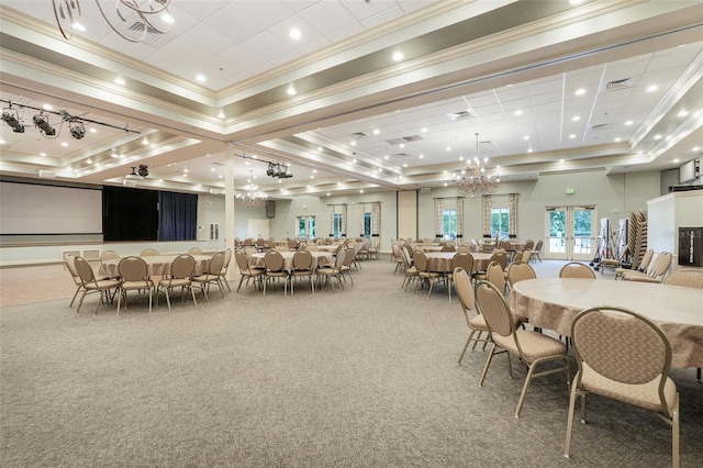 1990 Wallingford Loop, Mount Dora, FL 32757 - carpeted dining area featuring crown molding, a raised ceiling, and a chandelier