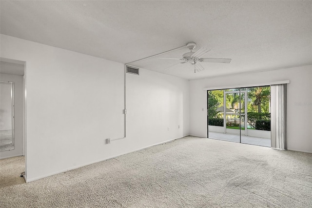 101 N Grandview St Unit 103, Mount Dora, FL 32757 - carpeted spare room featuring ceiling fan and a textured ceiling