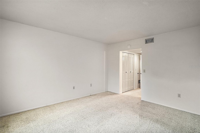 101 N Grandview St Unit 103, Mount Dora, FL 32757 - empty room featuring light colored carpet and baseboards