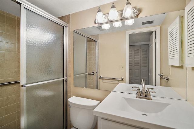 101 N Grandview St Unit 103, Mount Dora, FL 32757 - bathroom featuring a stall shower, vanity, and a closet