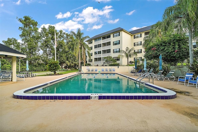 101 N Grandview St Unit 103, Mount Dora, FL 32757 - community pool featuring a patio area