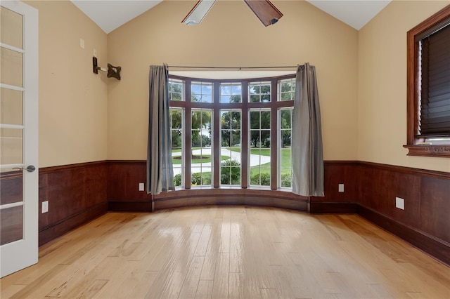 1325 Otters View Ct, Fruitland Park, FL 34731 - spare room featuring lofted ceiling, wood finished floors, wainscoting, and wood walls