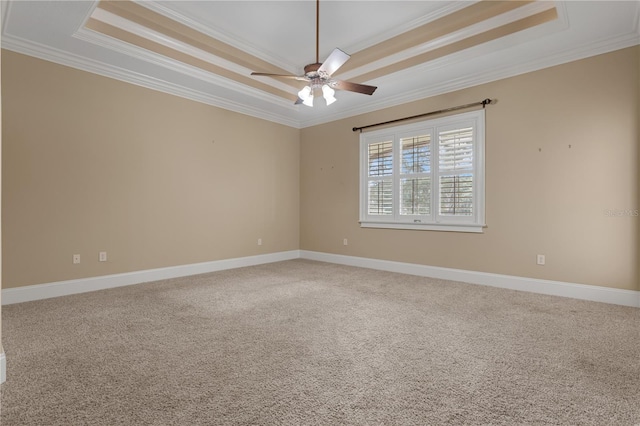1325 Otters View Ct, Fruitland Park, FL 34731 - spare room with a tray ceiling, crown molding, carpet, and a ceiling fan