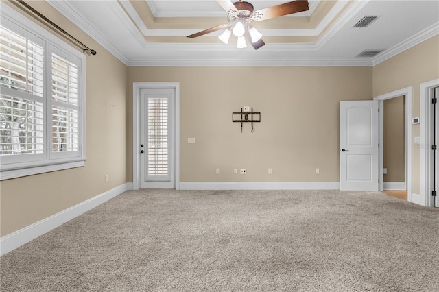 1325 Otters View Ct, Fruitland Park, FL 34731 - carpeted empty room with crown molding, a ceiling fan, and a tray ceiling