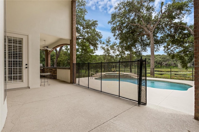 1325 Otters View Ct, Fruitland Park, FL 34731 - view of swimming pool with a patio and an in-ground hot tub
