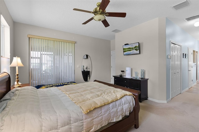 5620 Illumination Ln, Leesburg, FL 34748 - bedroom featuring light colored carpet and a ceiling fan