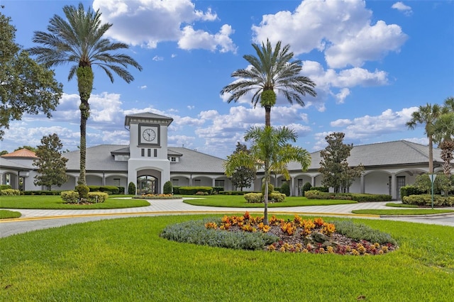 5620 Illumination Ln, Leesburg, FL 34748 - view of community featuring a lawn and curved driveway