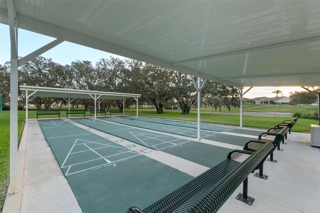 5620 Illumination Ln, Leesburg, FL 34748 - view of home's community featuring a lawn and shuffleboard