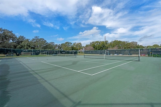 5620 Illumination Ln, Leesburg, FL 34748 - view of tennis court featuring community basketball court
