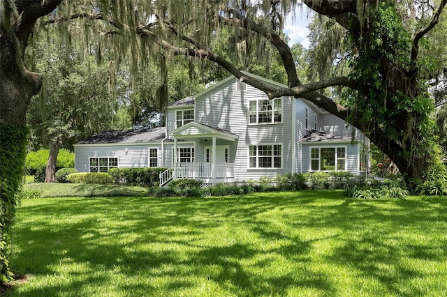9223 Silver Lake Dr, Leesburg, FL 34788 - rear view of house featuring a yard