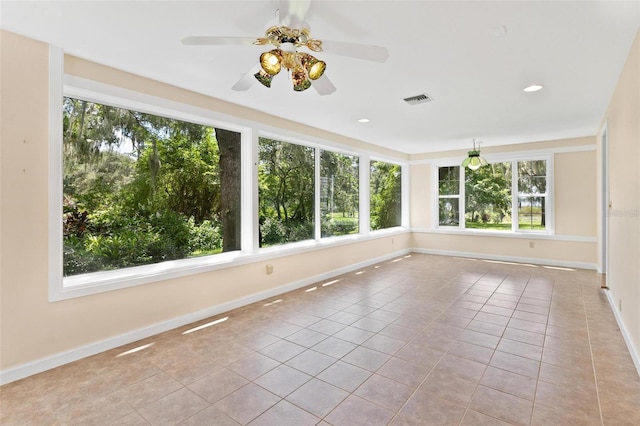 9223 Silver Lake Dr, Leesburg, FL 34788 - unfurnished sunroom featuring tile patterned flooring and recessed lighting