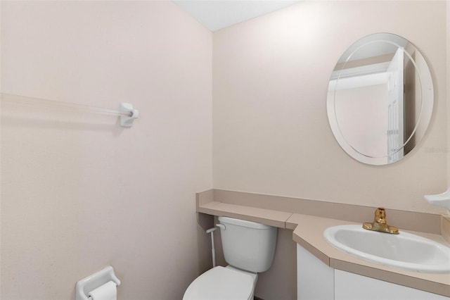 9223 Silver Lake Dr, Leesburg, FL 34788 - half bathroom featuring vanity and toilet