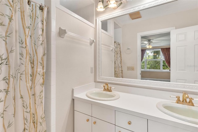 9223 Silver Lake Dr, Leesburg, FL 34788 - full bathroom with double vanity, a shower with curtain, and ceiling fan