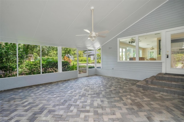 9223 Silver Lake Dr, Leesburg, FL 34788 - unfurnished sunroom with a ceiling fan, lofted ceiling, and entry steps