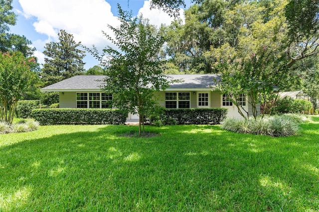 9223 Silver Lake Dr, Leesburg, FL 34788 - ranch-style house with a front lawn