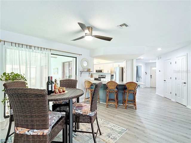 3723 Toulouse Ct, Punta Gorda, FL 33950 - dining space featuring light wood-style floors and a ceiling fan