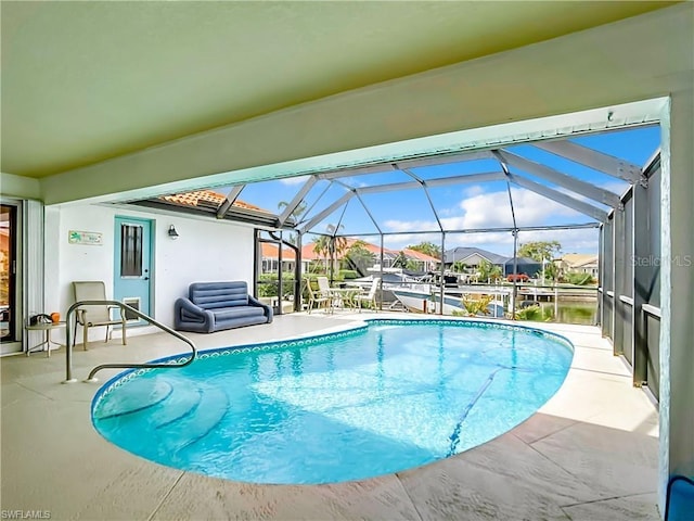 3723 Toulouse Ct, Punta Gorda, FL 33950 - swimming pool featuring a patio area and glass enclosure