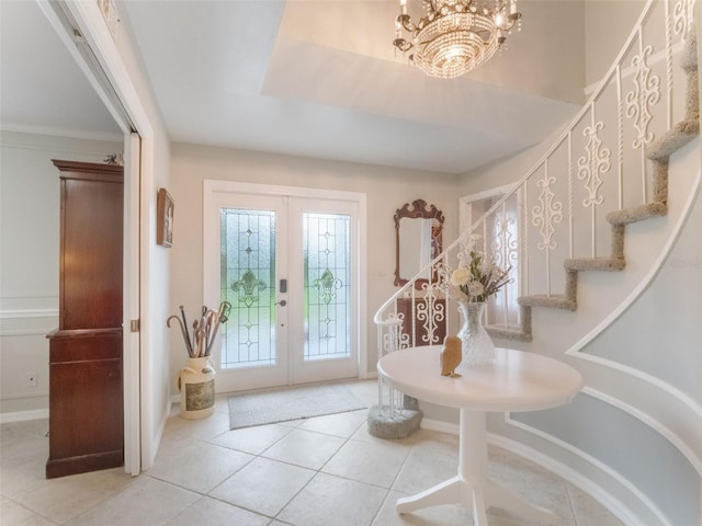 5556 Round Lake Rd, Apopka, FL 32712 - foyer entrance featuring stairs, french doors, tile patterned floors, and a chandelier