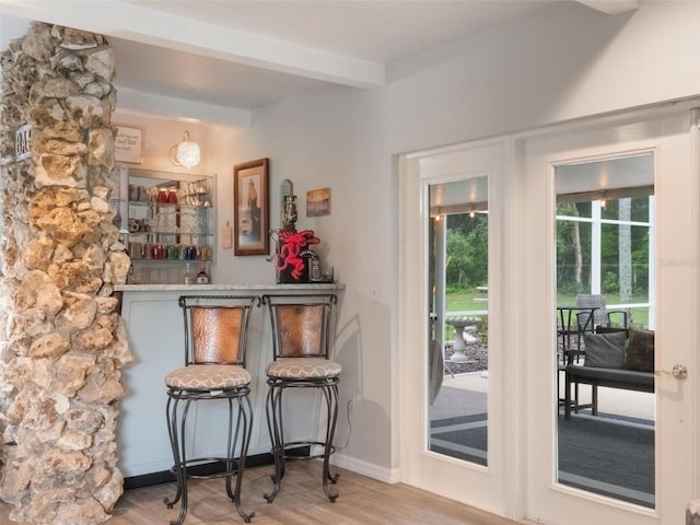 5556 Round Lake Rd, Apopka, FL 32712 - indoor dry bar featuring wood finished floors and beam ceiling