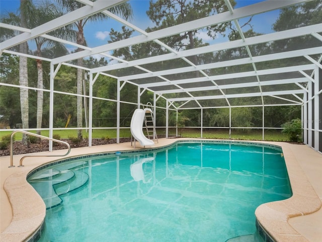 5556 Round Lake Rd, Apopka, FL 32712 - swimming pool with a water slide, glass enclosure, and a patio area